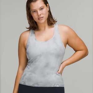 Lululemon swiftly tech Racerback tank 
   Top 2.0 race legnth size 4